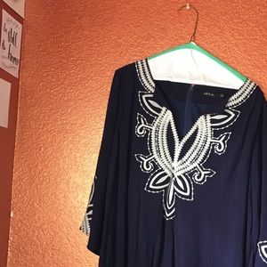 Navy dress with white lace pattern